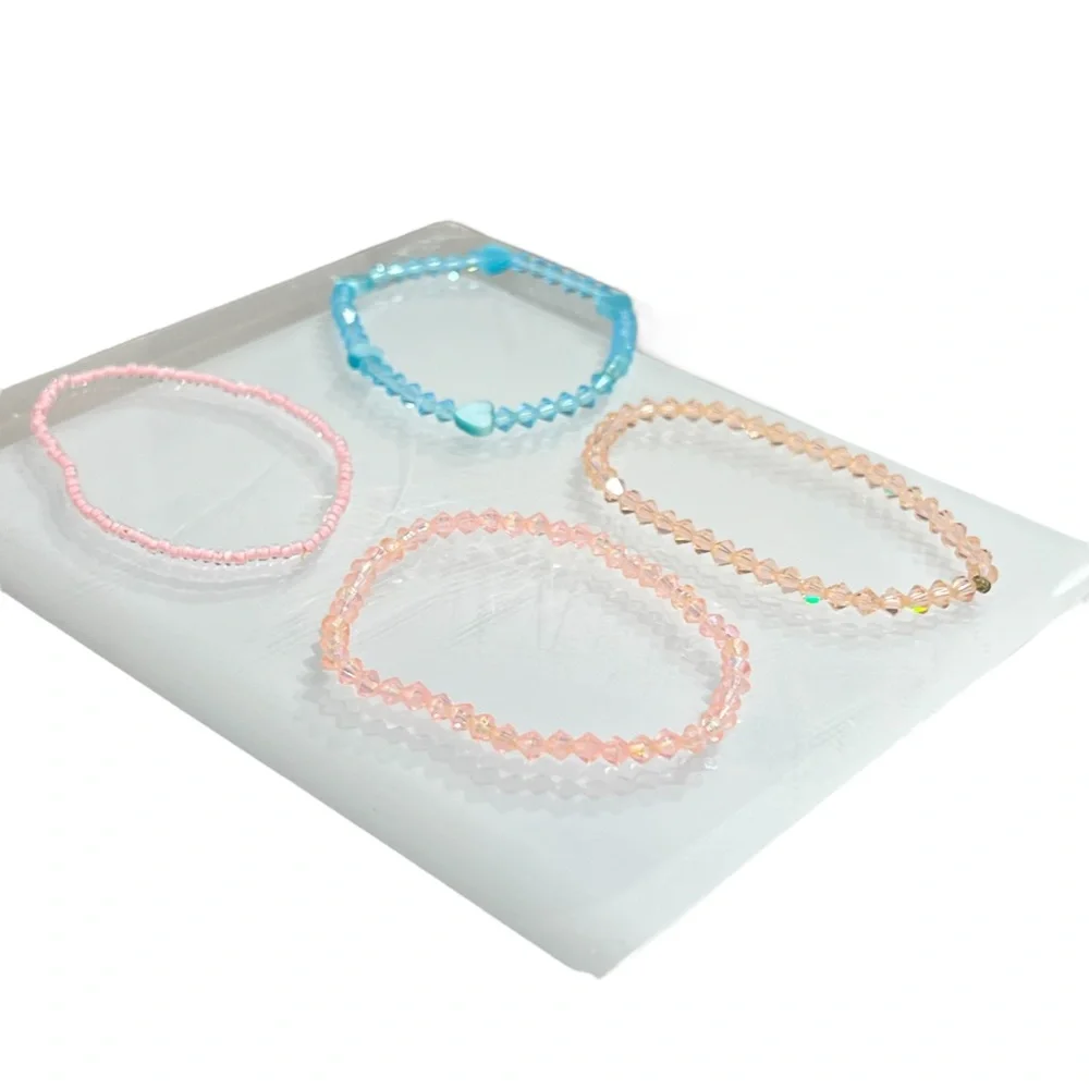 CRYSTAL STRETCH BRACELETS - PINK, PEACH, & BLUE - SET OF 4